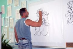 Ilustrator Uroš pri ustvarjanju ilustracije
